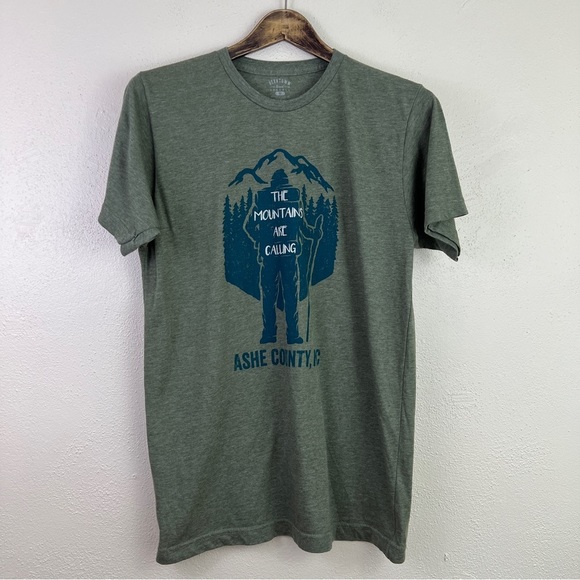Beantown Brand Apparel Ashe County, NC The Mountains Are Call Hiking Graphic Tee - Picture 1 of 7